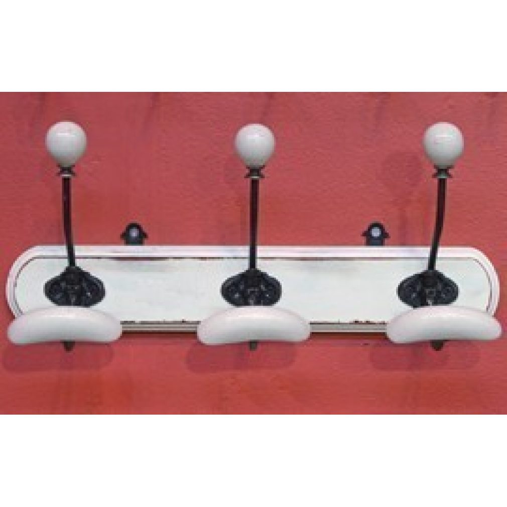 3 ceramic coat hooks on block