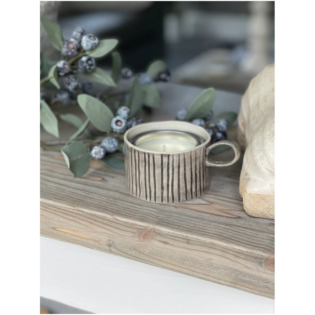 Handled Candle holder with candle in tin by East of India